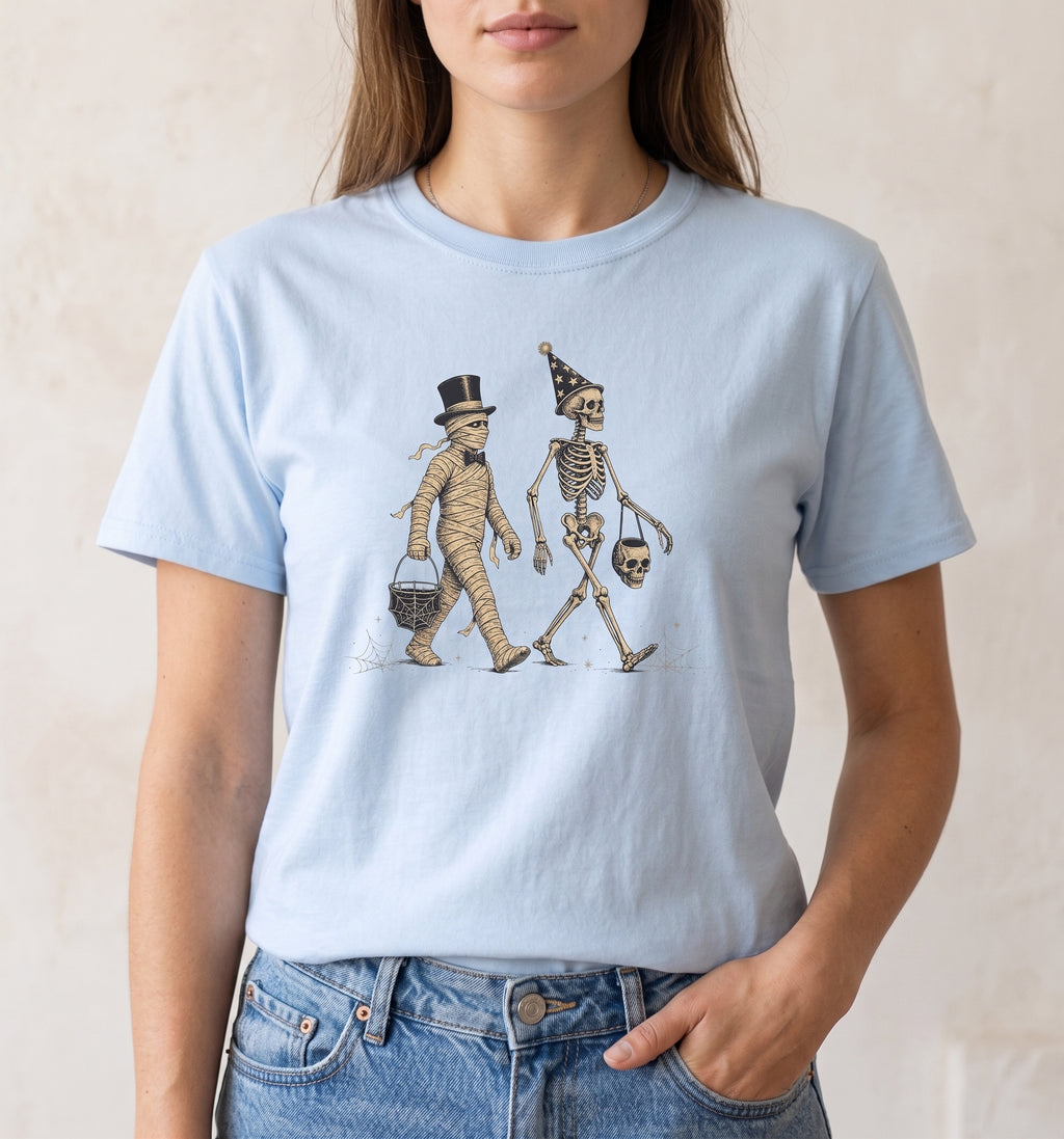 Trick or Treat — Vintage Halloween Skeleton & Mummy Graphic Tee