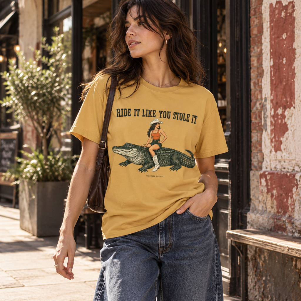 Ride It Like You Stole It — Cowgirl & Alligator Graphic Tee
