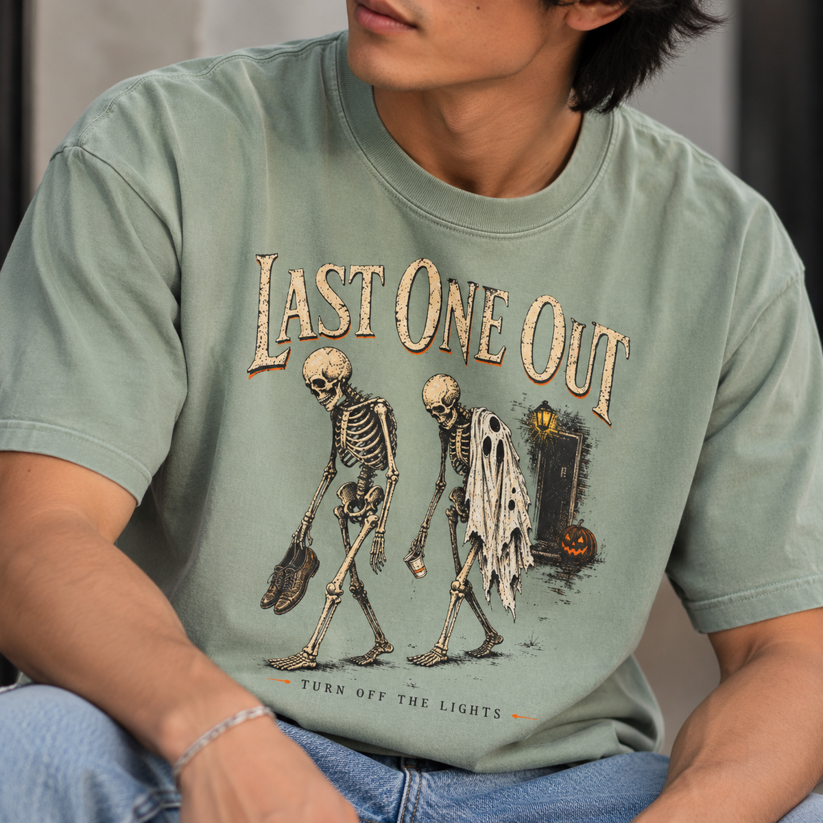 Last One Out — Vintage Halloween Skeleton Graphic Tee